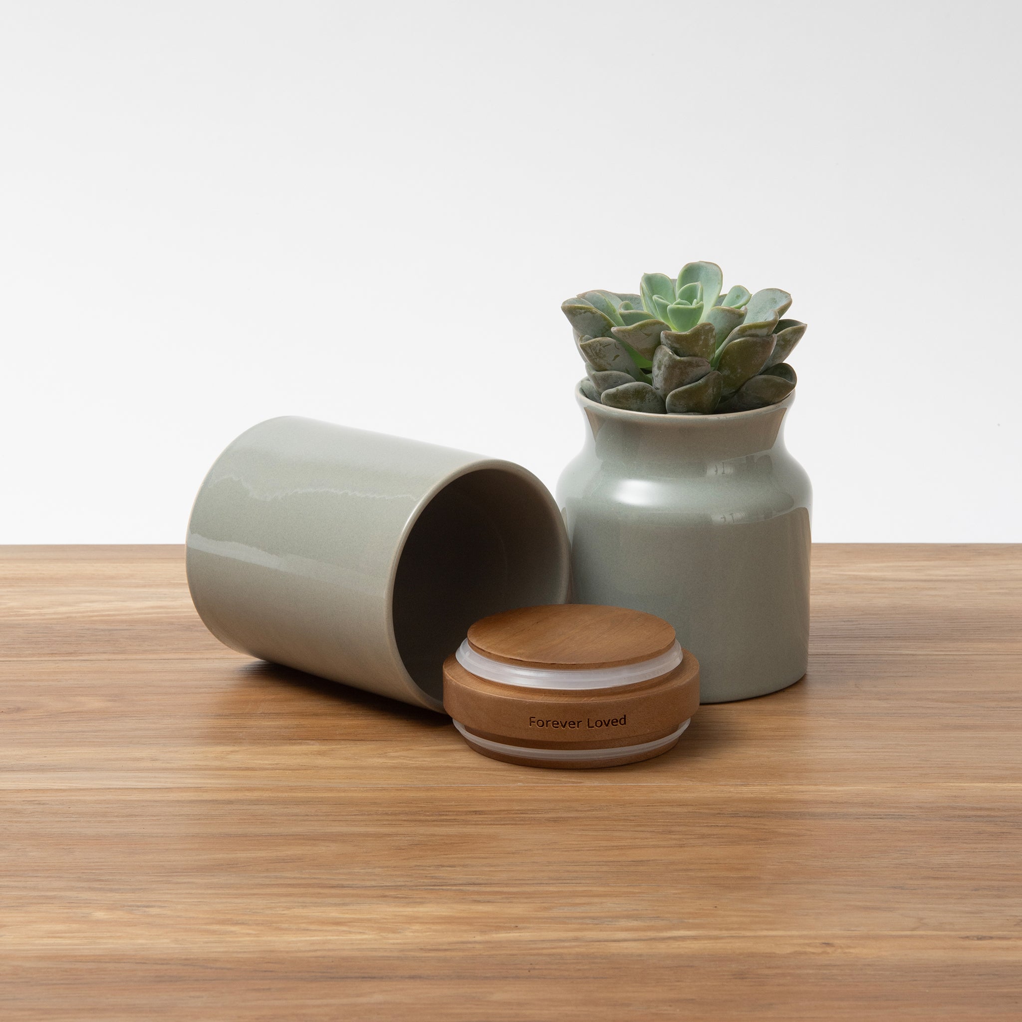 Grey pet urn vase. Sky Urns custom pet urns can be used as dog urns or cat urns. They make beautiful pet memorial urns or custom memorial urns.