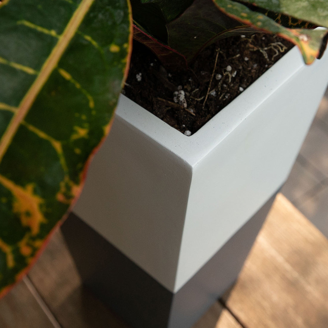 Grey and white outdoor pet urn. Sky Urns custom pet urns can be used as dog urns or cat urns. They make beautiful pet memorial urns or custom memorial urns.