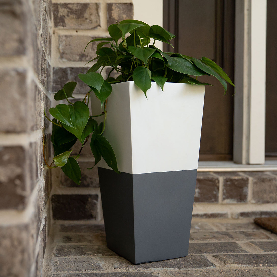 Grey and white outdoor pet urn. Sky Urns custom pet urns can be used as dog urns or cat urns. They make beautiful pet memorial urns or custom memorial urns.