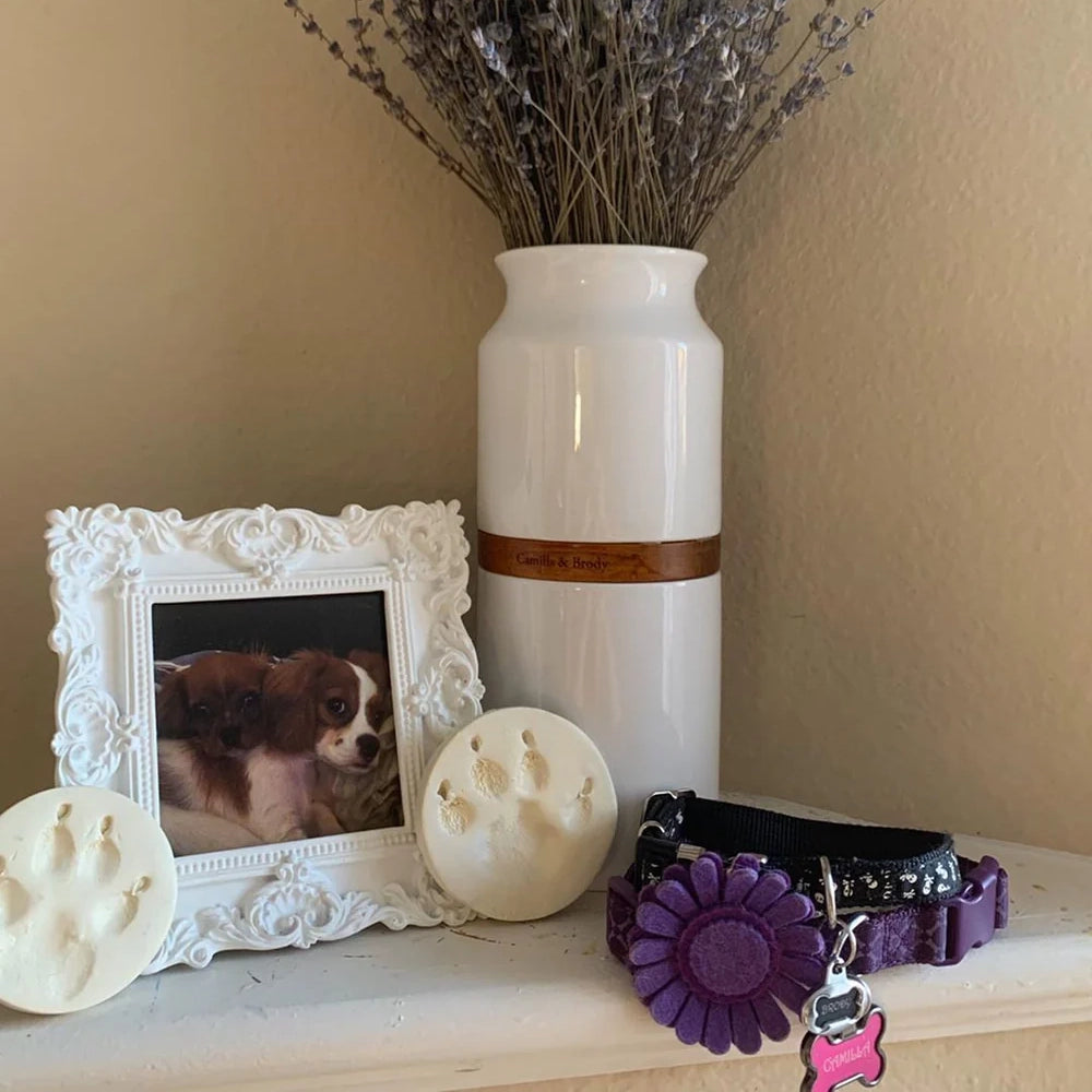 White pet urn vase. Sky Urns custom pet urns can be used as dog urns or cat urns. They make beautiful pet memorial urns or custom memorial urns. Custom engraving.